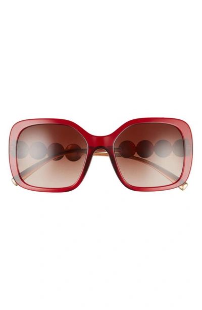 Shop Versace 53mm Polarized Square Sunglasses In Transparent Red/ Brown Grad