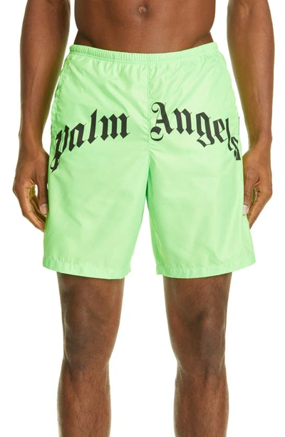 Shop Palm Angels Curved Logo Swim Trunks In Green