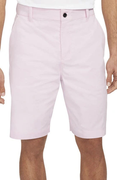 Shop Nike Dri-fit Uv Flat Front Chino Golf Shorts In Pink Foam