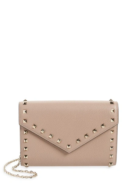 Shop Valentino Rockstud Leather Envelope Wallet On A Chain In Poudre