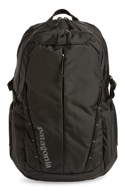 Shop Patagonia 28 Liter Refugio Nylon Backpack In Black