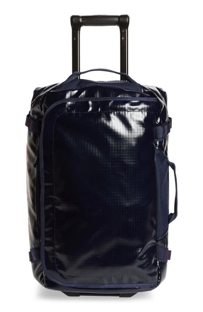 Shop Patagonia Black Hole 40-liter Rolling Duffle Bag In Classic Navy