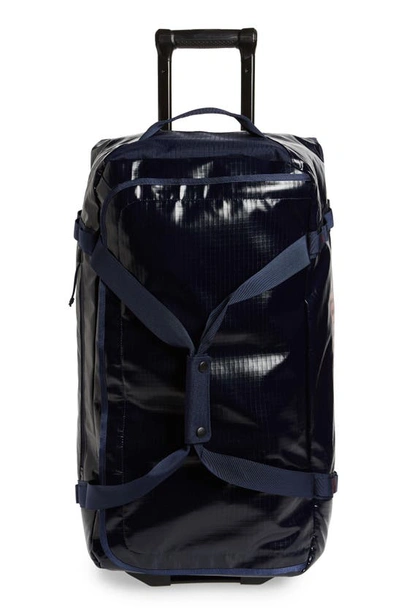 Shop Patagonia Black Hole 70-liter Rolling Duffel Bag In Classic Navy