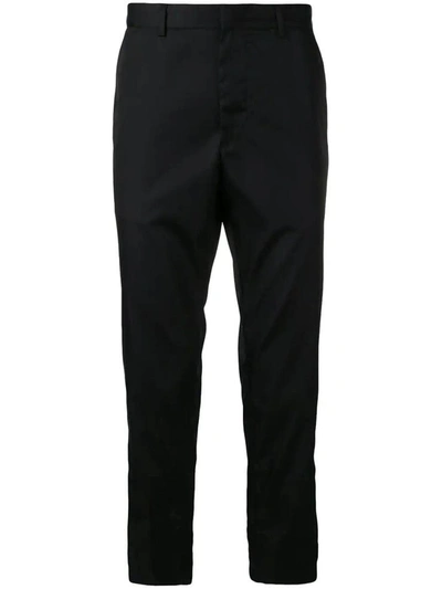 Shop Prada Strap Cuff Trousers In Nero