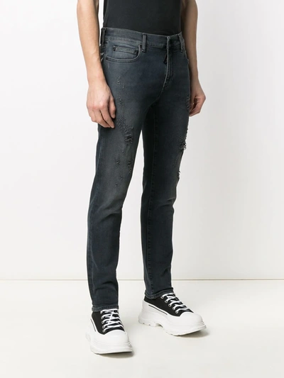 Shop Off-white Off White Ripped Detail Bootcut Jeans In Nero