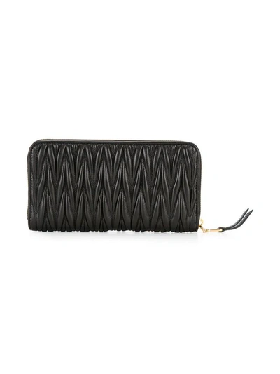 Shop Miu Miu Miumiu Matelassé Zip Around Wallet In Nero