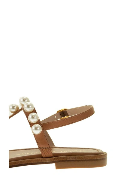 Shop Stuart Weitzman Goldie T-strap - Pearl Sandal In Tan