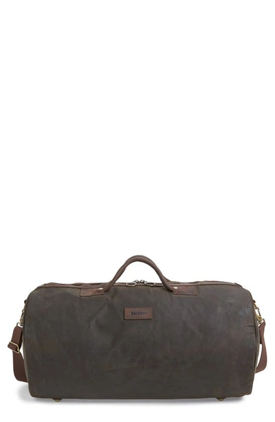 Shop Barbour Waxed Canvas Duffle Bag In Olive