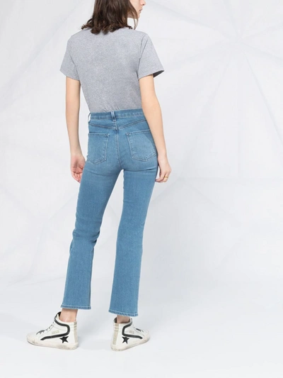 Shop J Brand Cropped Bell Leg Jeans In Blu
