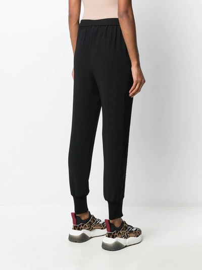 Shop Stella Mccartney Lace Cut-out Tapered Trousers In Angel Blue