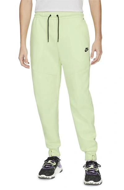 Shop Nike Tech Fleece Jogger Sweatpants In Light Liquid Lime/ Black