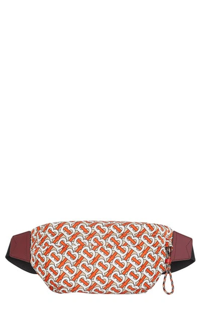 Shop Burberry Sonny Monogram Nylon Belt Bag In Vermillion