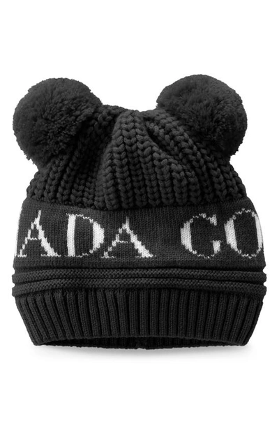 Shop Canada Goose Double Pompom Hat In Black