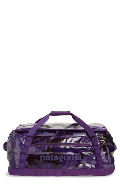Shop Patagonia Black Hole Water Repellent 55-liter Duffle Bag In Home Planet Piton Purple-hppp