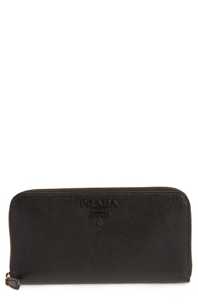 Shop Prada Monochrome Saffiano Leather Zip Around Wallet In Nero