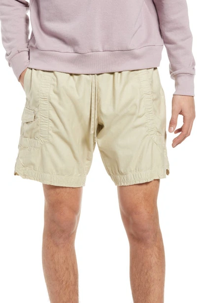 Shop John Elliott Frame Cotton Poplin Cargo Shorts In Desert