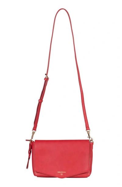 Shop Twelvelittle Peekaboo Crossbody Diaper Bag In Red