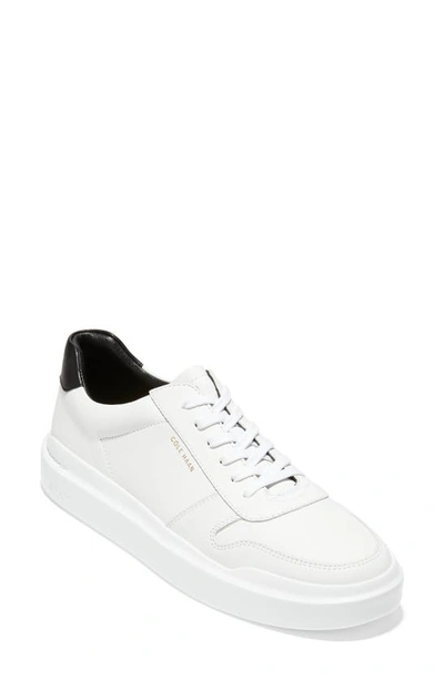 Shop Cole Haan Grandpro Rally Sneaker In White/ Black Leather