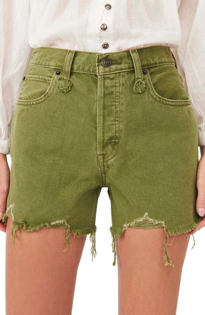 Shop Free People Makai Ripped Cutoff Denim Shorts In Olive
