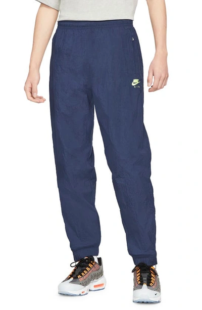 Shop Nike Air Nylon Track Pants In Obsidian