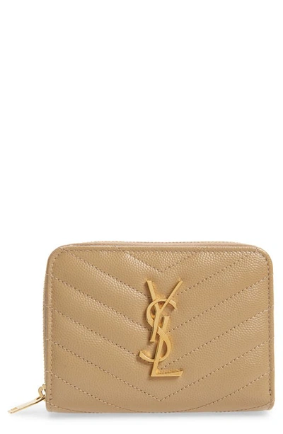 Shop Saint Laurent Monogramme Compact Quilted Zip Around Wallet In Latte