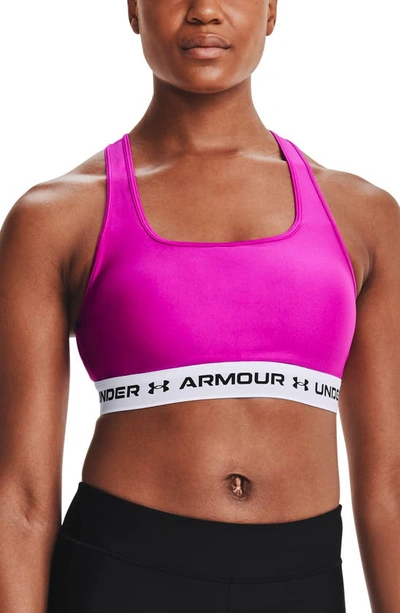 Shop Under Armour Heatgear® Mid Cross Back Sports Bra In Meteor Pink / White / Black