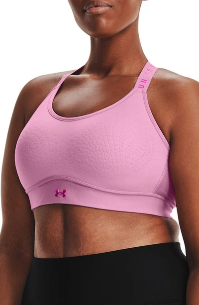 Shop Under Armour Infinity Mid Sports Bra In Planet Pink / Meteor Pink