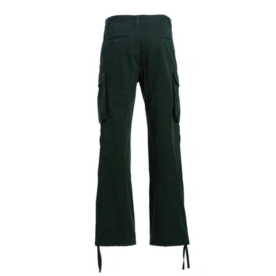 Shop Off-white Trousers In Green - White