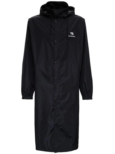 Shop Balenciaga Long Nylon Raincoat With Logo Print In Black