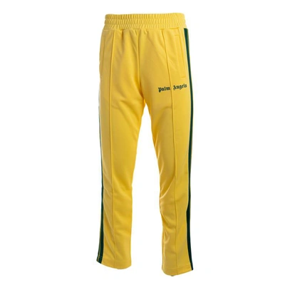 Shop Palm Angels Trousers In Yellow - Green