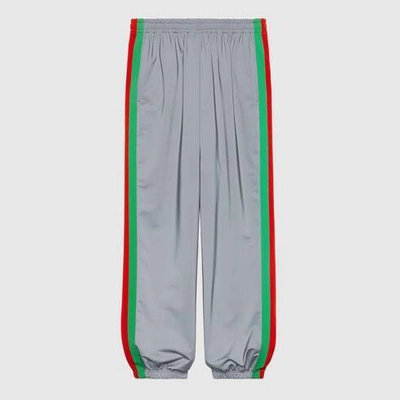 Shop Gucci Reflective Side Stride Track Pants In Beige Ebony