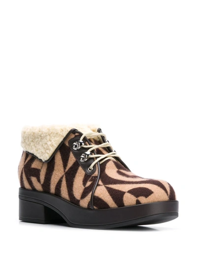 Shop Gucci Monogram Print 45mm Ankle Boots In Beige Ebony
