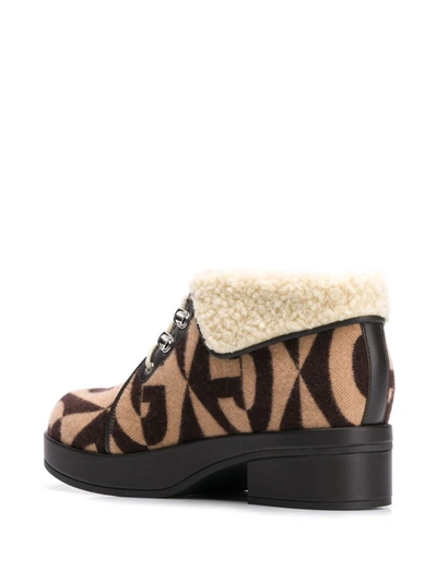 Shop Gucci Monogram Print 45mm Ankle Boots In Beige Ebony