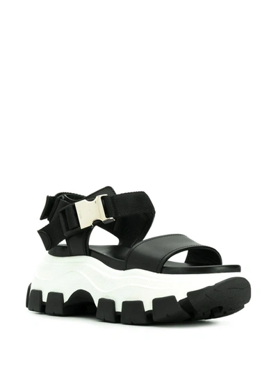 Shop Prada Pegasus Strap Sandals In Nero+bianco