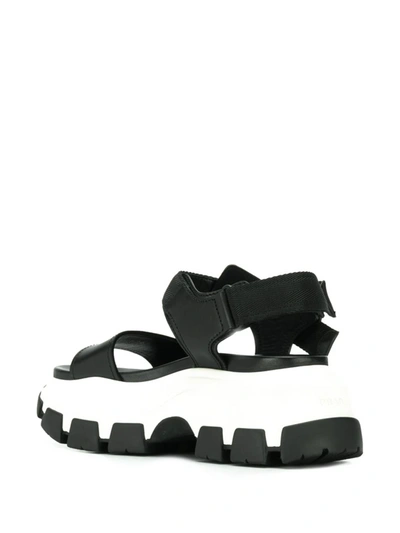 Shop Prada Pegasus Strap Sandals In Nero+bianco