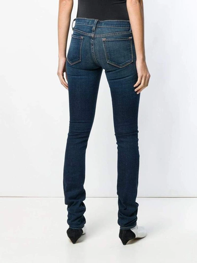 Shop J Brand Distressed Skinny Jeans In Blue