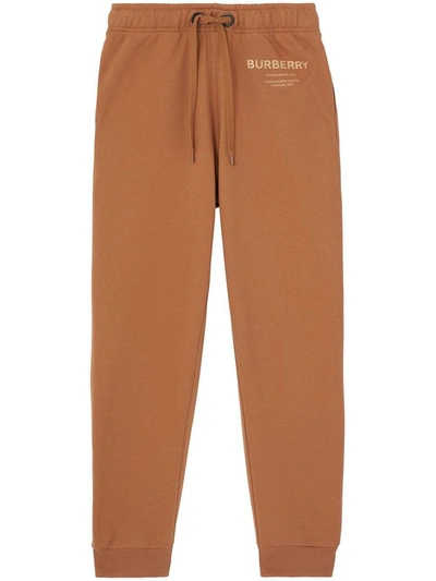 Shop Burberry Trousers Beige