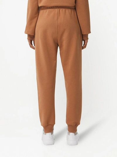 Shop Burberry Trousers Beige