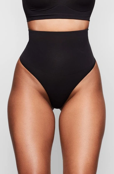 Shop Skims Core Control Thong In Onyx