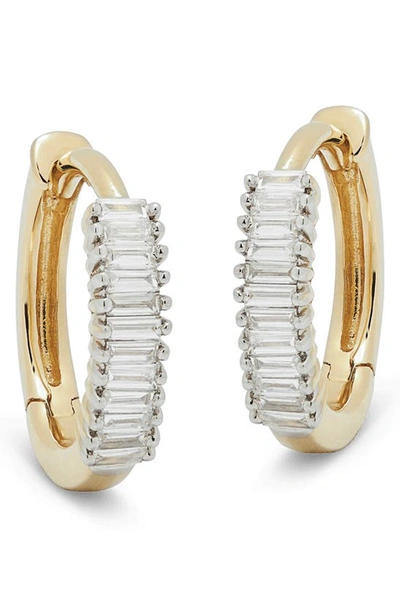 Shop Stone And Strand Baguette Diamond Huggie Hoop Earrings In Yellow Gold