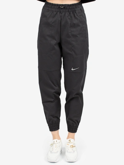 Shop Nike Sportswear Swoosh Pants In Black
