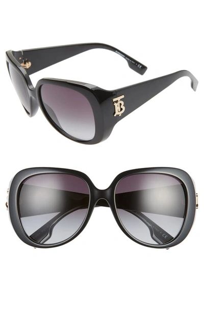 Shop Burberry 57mm Round Sunglasses In Black/grey Gradient