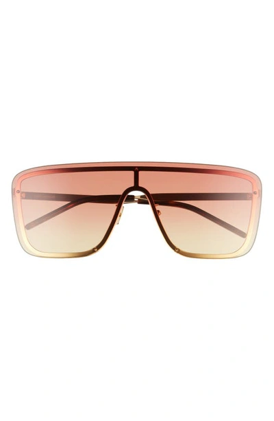 Shop Saint Laurent 99mm Flat Front Shield Sunglasses In Gold/ Orange Gradient