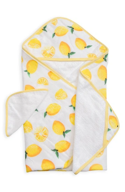 Shop Little Unicorn Hooded Towel And Washcloth Set In Lemon