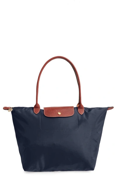 Shop Longchamp Large Le Pliage Tote In New Navy