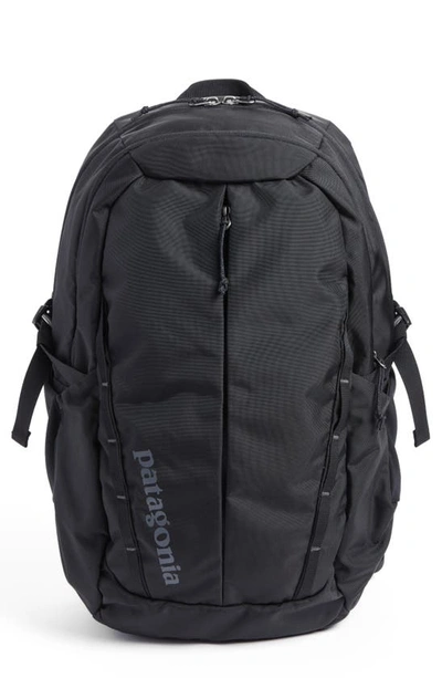 Shop Patagonia Refugio 26l Backpack In Black