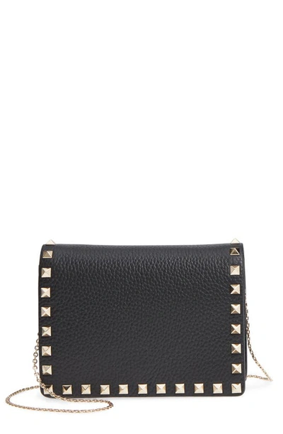Shop Valentino Rockstud Leather Pouch Wallet On A Chain In Nero/ Gold