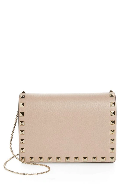 Shop Valentino Rockstud Leather Pouch Wallet On A Chain In Poudre Rockstud