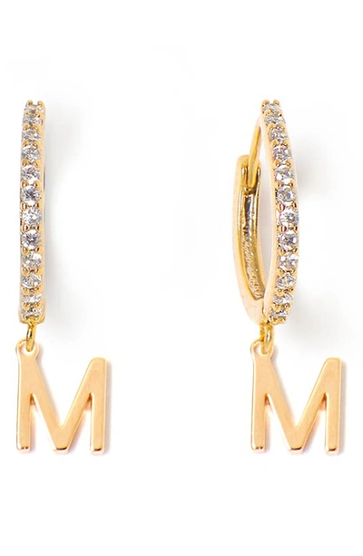 Shop Tess + Tricia Initial Huggie Hoop Earrings In Gold M