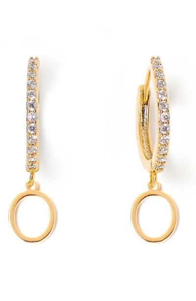 Shop Tess + Tricia Initial Huggie Hoop Earrings In Gold O